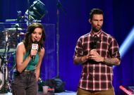 Grimmie with Adam Levine (Image via Getty)